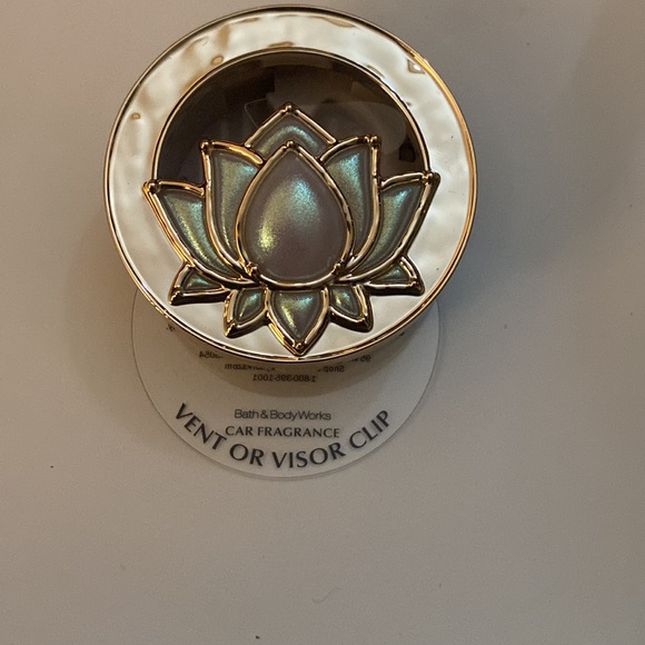 This is a car fragrance holder and a wall fragrance holder for the home. - Picture 3 of 3